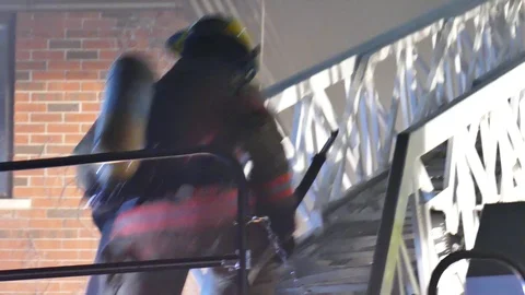 Two firemen escalading ladder Video stock 116079422