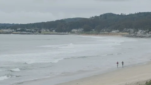Two fishermen at the beach Stock Footage 93963581