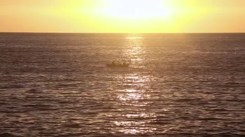 Two fishermen in the sunset Stock Footage 58110531