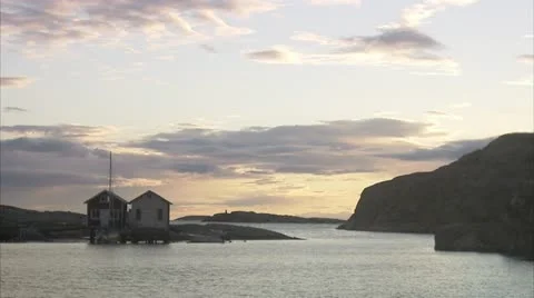 Two fishing-huts at twilight Stock Footage 11287724
