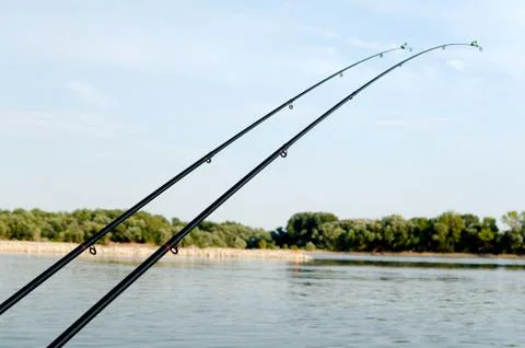 Two fishing rods Stock Photos