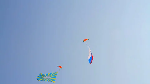 Two of the flag flying in the sky on a holiday parachutists Stock Footage 28364667