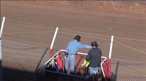 Two Flagmen At A Car Race 3 스톡 동영상 18972787