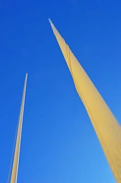 Two flagpoles Stock Photos