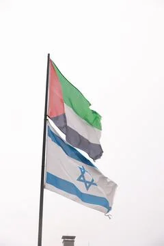 Two flags are flying side by side Stock Photos