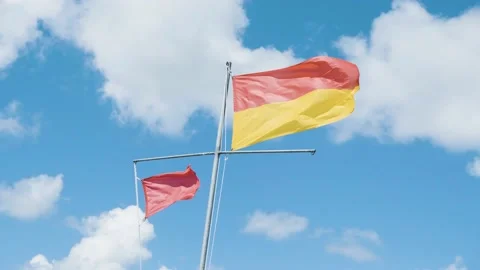 Two flags waving in the wind Stock Footage 138585719