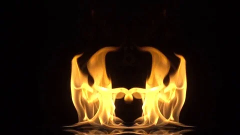 Two flames move synchronously. isolated over black background. slow motion Stock Footage 82747111