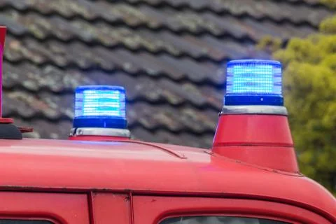 Two flashing blue lights Stock Photos