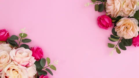 Two floral bloom bouquets move and love write on pink background. Stop motion Stock Footage 149939828