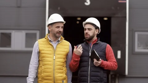 Two foremans control loading Containers box for Logistic Import Export Stock Footage 111482183