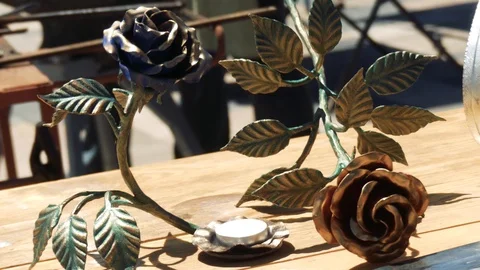 Two forged roses. Close-up Stock Footage 110836983
