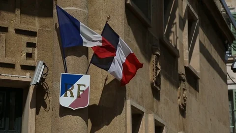 Two french flags waving on a town hall Stock Footage 75354429