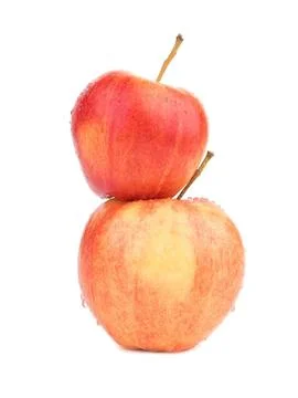 Two fresh apples stacked with one on top of the other 库存照片