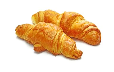 Two fresh croissant, casting soft shadow on white. delicious! Stock Photos