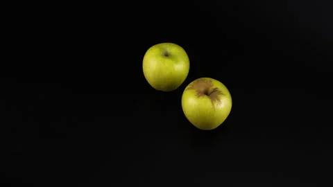 Two fresh green apples on a black background 스톡 동영상 331661184