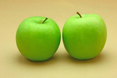 Two fresh green apples Stock Photos