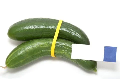 Two fresh green cucumbers Stock Photos