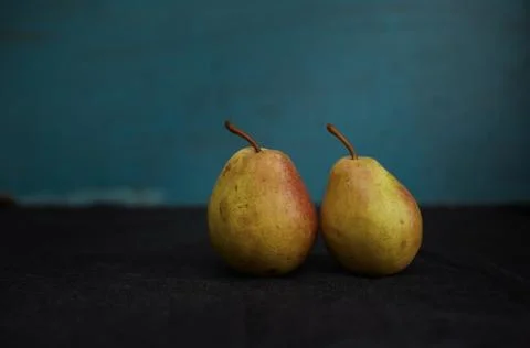 Two fresh pears on a table Stock Photos