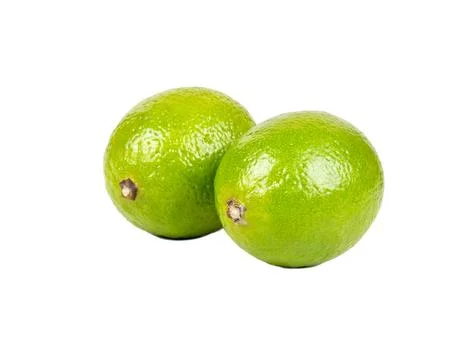 Two fresh small limes isolate Stock Photos