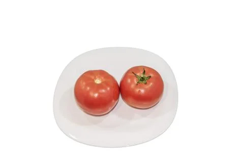 Two fresh tomatoes on white plat. Clipping Path 写真素材