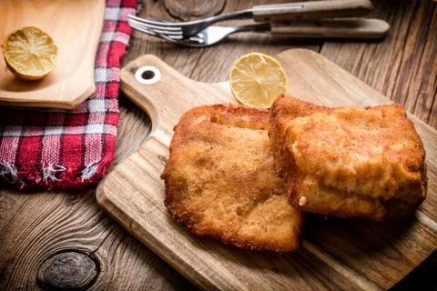 Two fried cod fillet pieces. Stock Photos