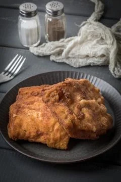 Two fried cod fillet pieces. Stock Photos