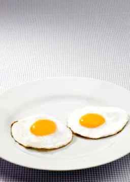 Two fried eggs Stock Photos