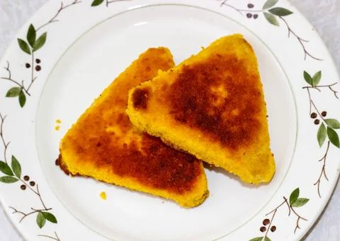 Two fried fish cutlets on a plate. Foto stock