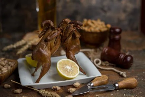 Two fried quailes in front of each other Stock Photos