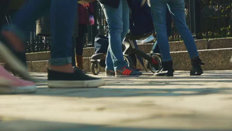 Two friends are standing in the middle of a busy city street Video stock 87147835