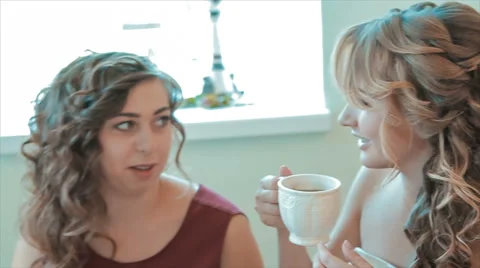 Two Friends Drink Tea in Room Slow Motion Stock Footage 68689679