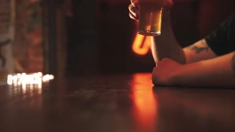 Two friends drinking beer in a bar Stock Footage 203878325
