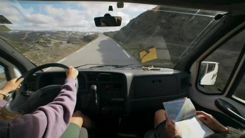 Two friends drive in camper van on epic road Video stock 241560215