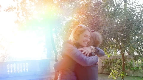 Two friends embrace warmly: meeting after a long time Stock Footage