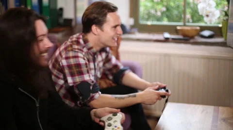 Two Friends Enjoy Multiplayer Video Game Stock Footage 56053032