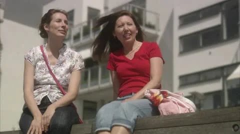 Two friends enjoying the sun Stock Footage 11287126