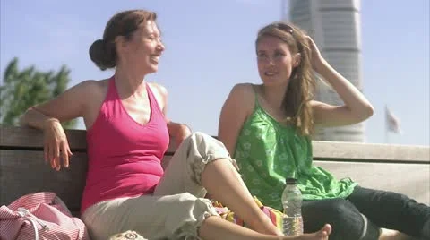 Two friends enjoying the sun Stock Footage 11287133