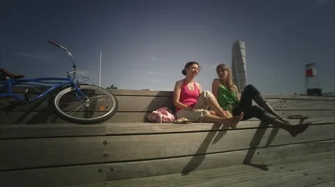 Two friends enjoying the sun Stock Footage