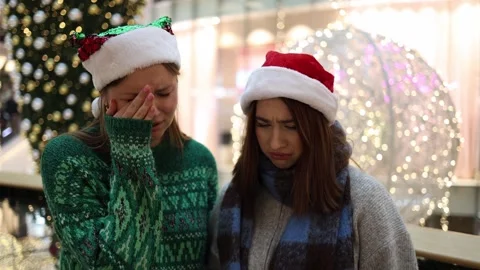 Two friends feeling sad and tired before christmas Video stock 325212662