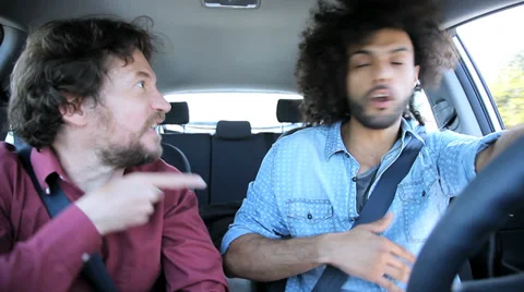Two friends fighting in car about betrayal of girlfriend Stock Footage 37112139