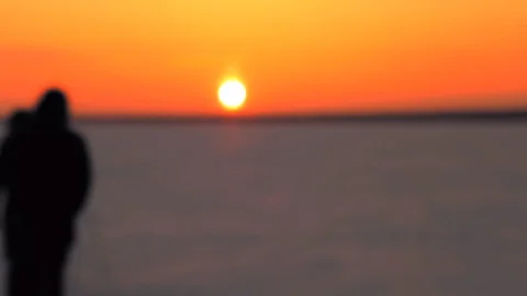 Two friends go towards the winter sunset Stock Footage 88485351