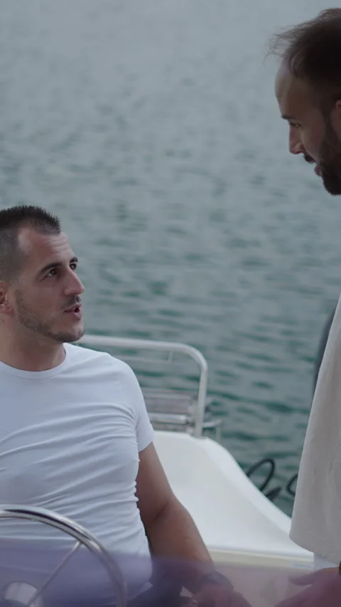 Two friends have a good time while they are on the boat Stock Footage 264924266