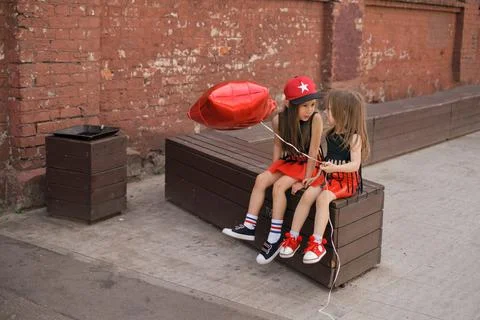 Two friends having fun chatting Stock Photos