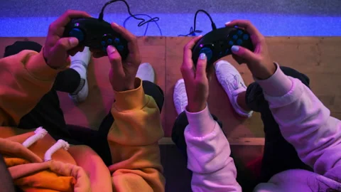 Two friends having fun in gaming addiction Stock Footage 150167899