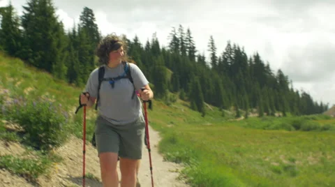 Two friends hike a path together Stock Footage 59432713