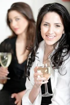 Two friends in a kitchen Stock Photos