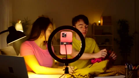 Two friends live streaming on phone Stock Footage 265193226