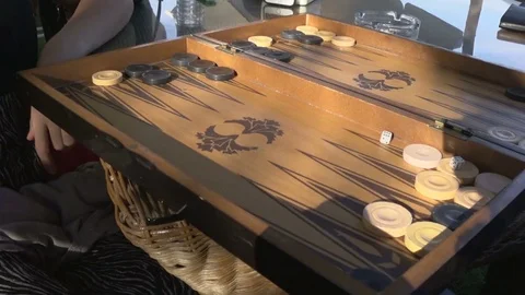 Two Friends Playing Backgammon Stock Footage 82732297