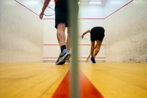 Two friends playing squash in Mutilva, Navarra, Spain Stock Photos