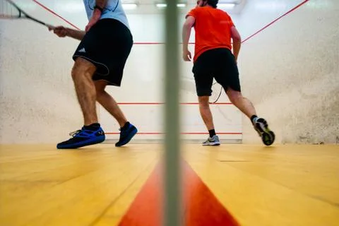 Two friends playing squash in Mutilva, Navarra, Spain Stock Photos